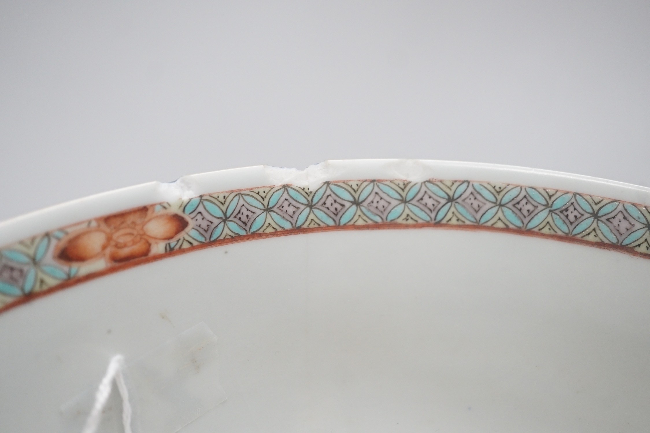 A 19th century Chinese famille verte powder blue bowl, 26cm diameter, wood stand